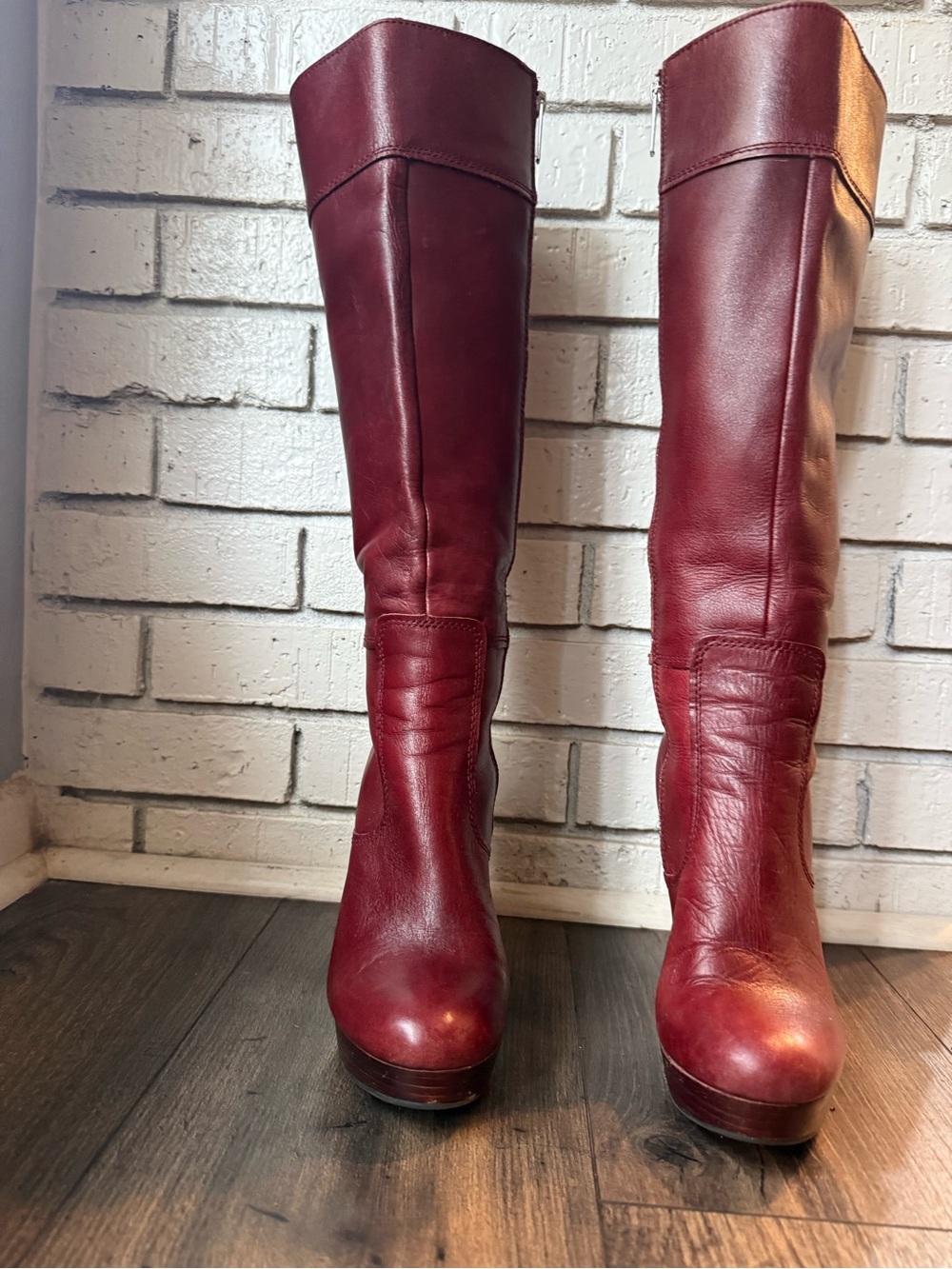 Burgundy/Reddish leather high heeled knee boots.  GianniBini